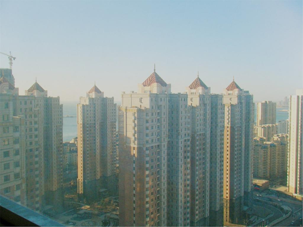 Xinghai Zhilian Apartment Dalian Bagian luar foto